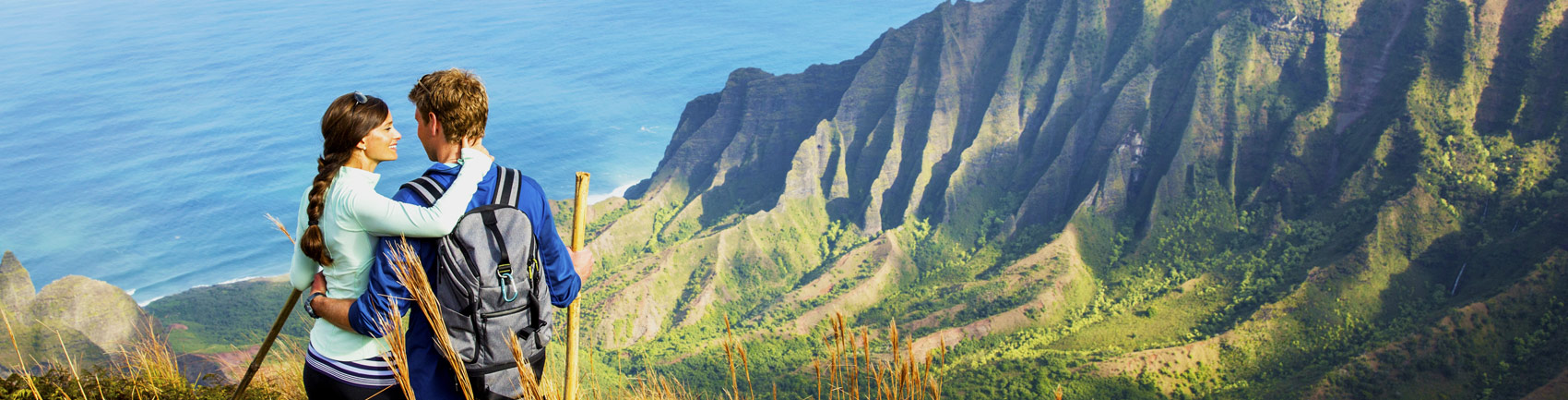 Couple looking over mountain range