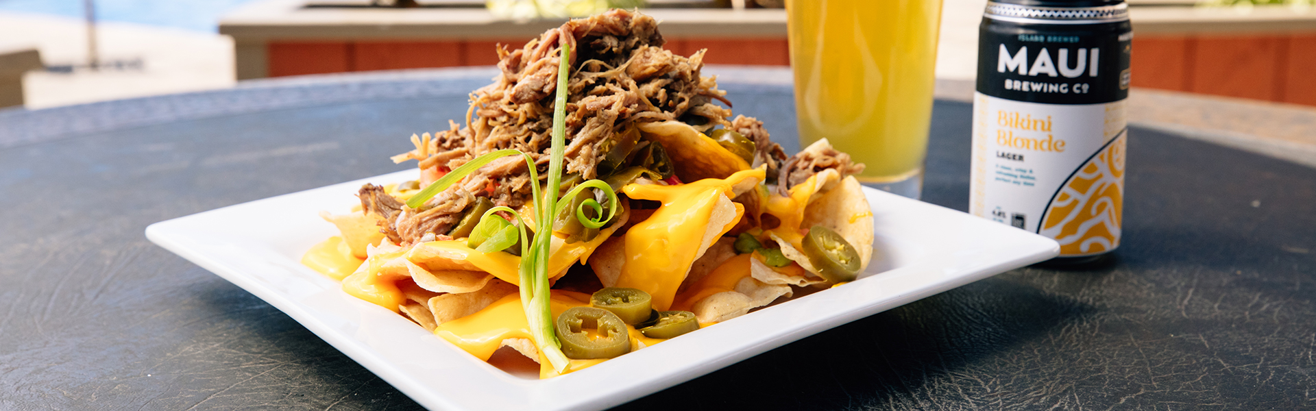 Close up of nachos and beer