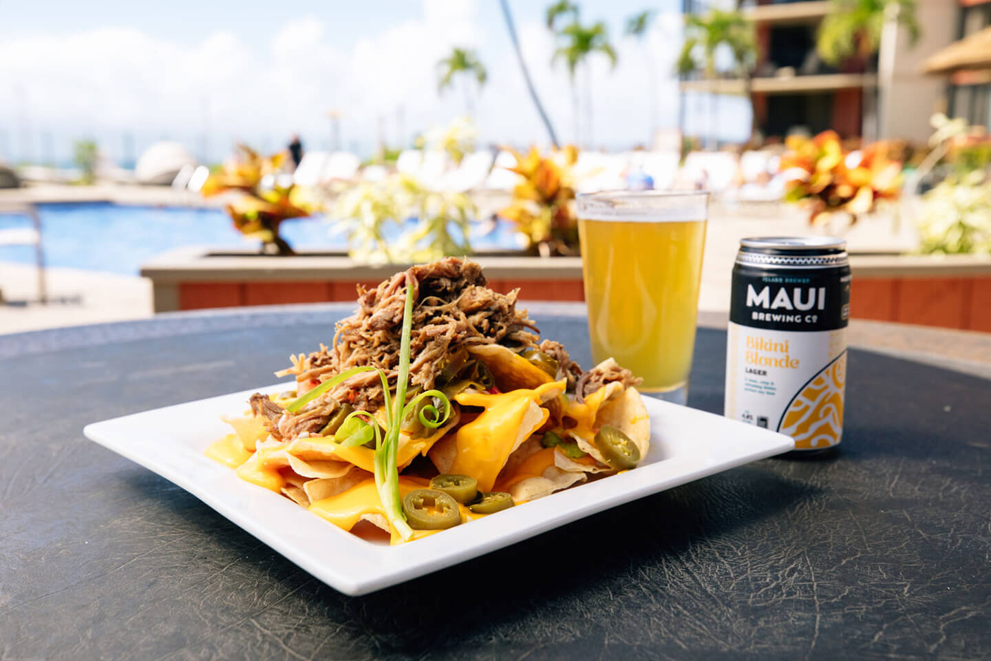 Nacho dish and Maui Brewing beer.