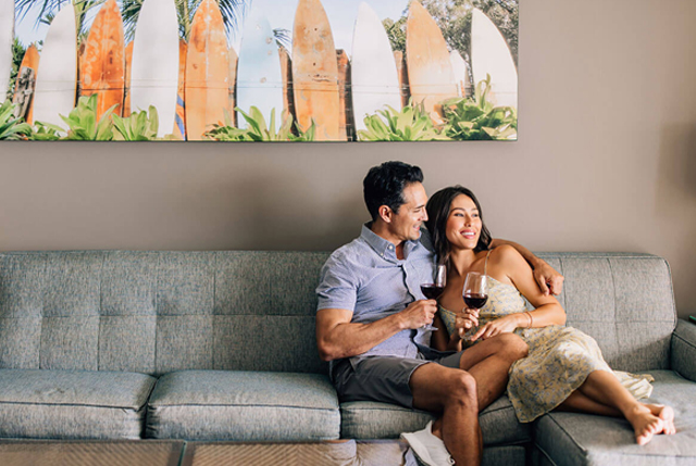 Living room with dining area, couches, coffee table