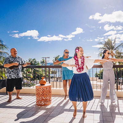 People dancing hula on deck