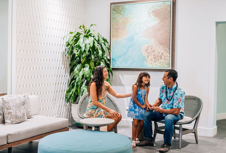 Family sitting in lobby