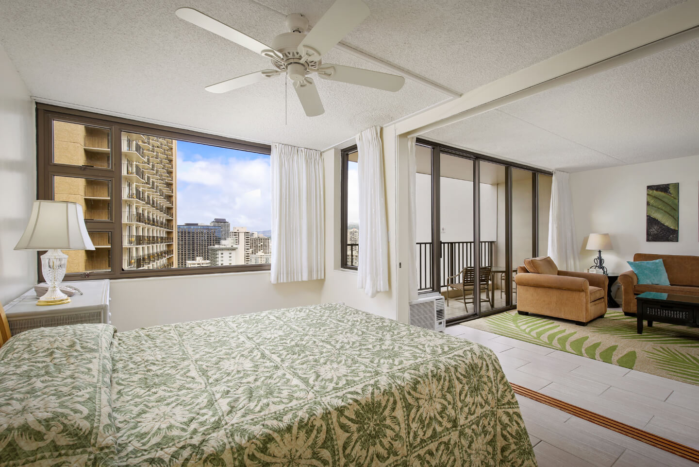 1-Bedroom Partial Ocean View kitchen, living area, separate bedroom, and private balcony.