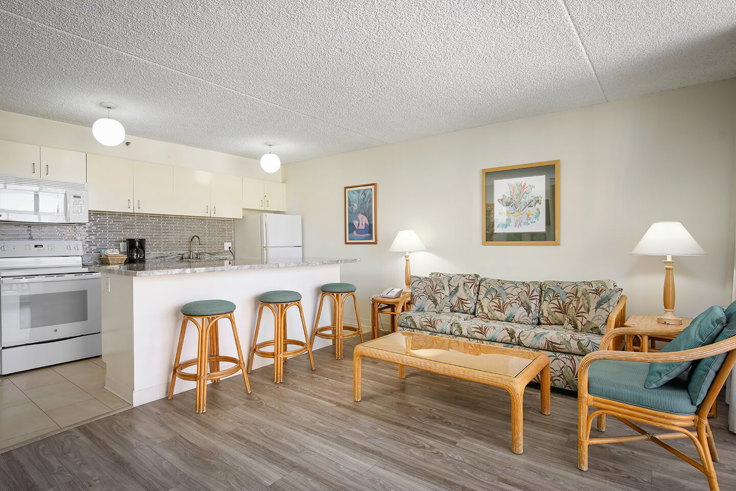 One-Bedroom Superior Suite with kitchen and sofa in living area.