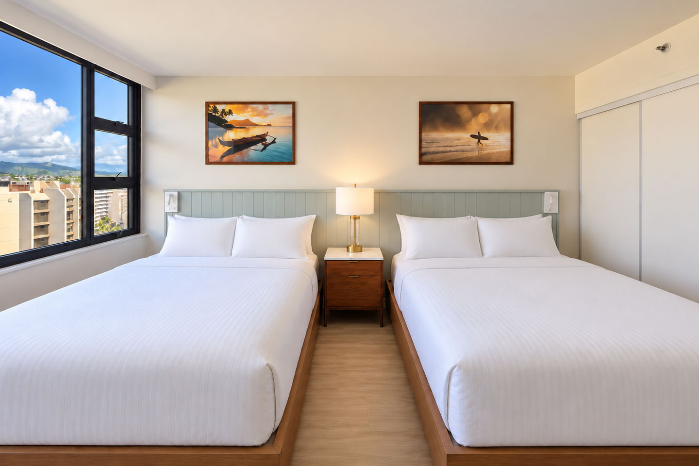 Bedroom with two queens and view of mountains.