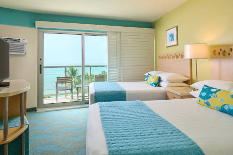 Oceanfront Room with Double Bed Accommodations and Plantation Shutters