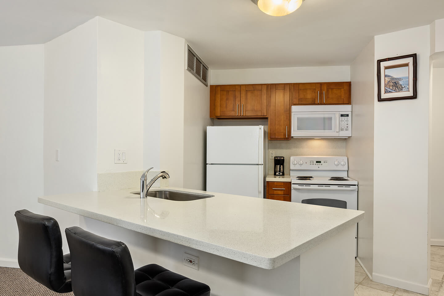 Kitchen, counter, bar stools 