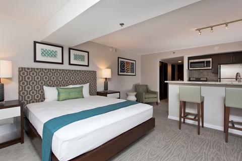 Luxury Junior Suite Poolside View Bedroom and Living Area