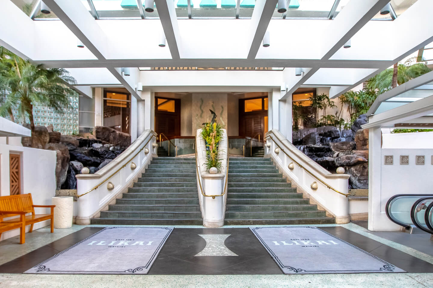 Open-air hotel lobby.