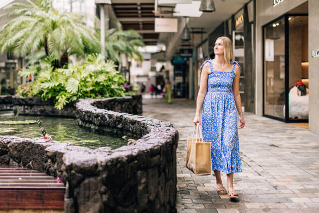 Woman shopping open-air mall.