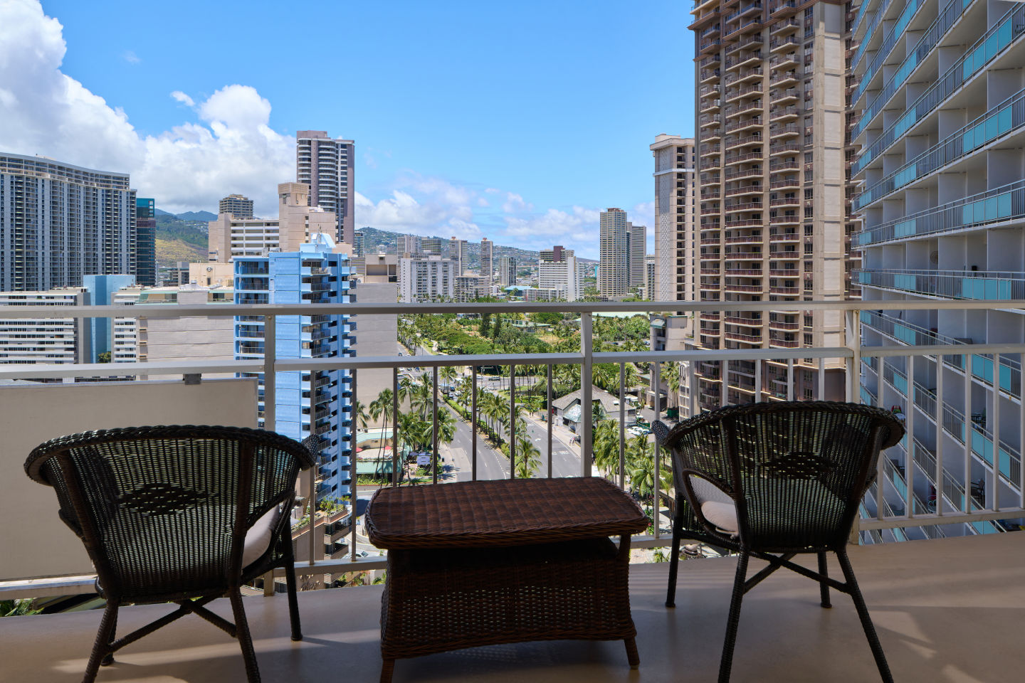 Mountain View Jr Suite private lanai with separate seating area and a outdoor table to enjoy the view