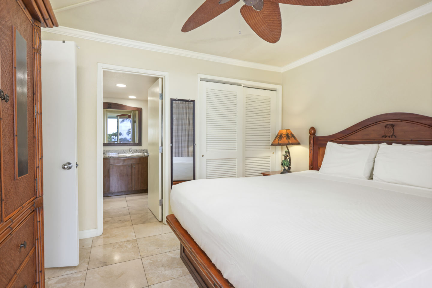 Room with a bed, closet, and ensuite bathroom.
