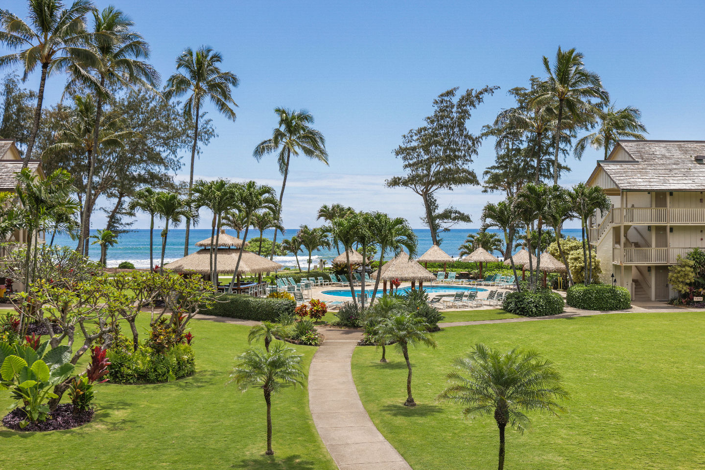 View from the room that looks out to the lush garden and path to the ocean