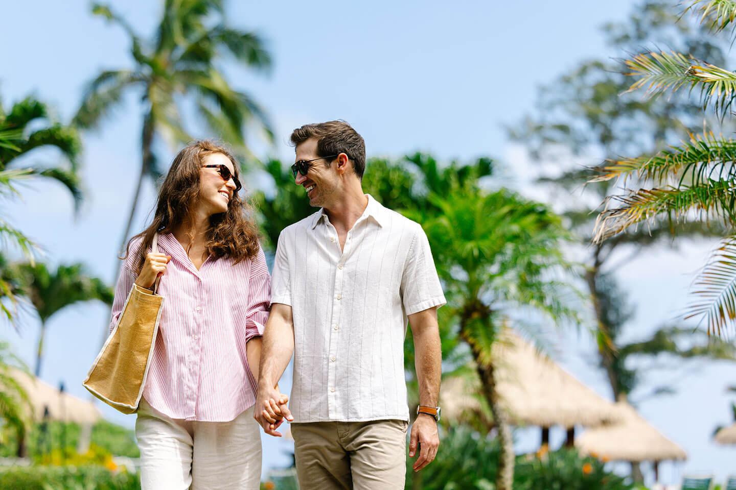Couple walking resort background
