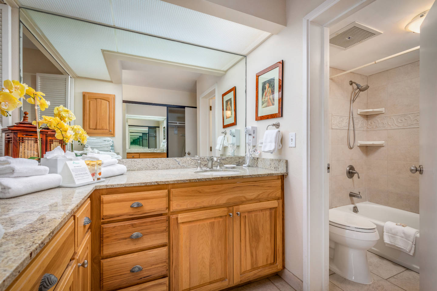 Bathroom with counters, sink, bathtub/shower.