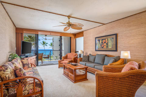 One-Bedroom Oceanfront Living room space with sofa and matching chairs and a coffee table