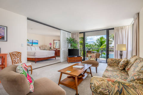 Two-Bedroom Oceanfront living room with sliding doors to master bedroom