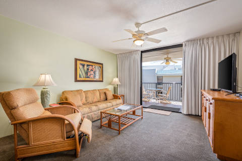 One-Bedroom Partial Ocean View Living with sofa and matching lounge chair