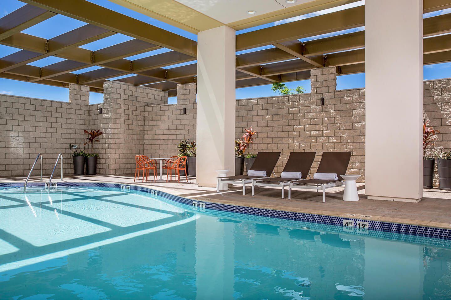 Pool and deck with loungers
