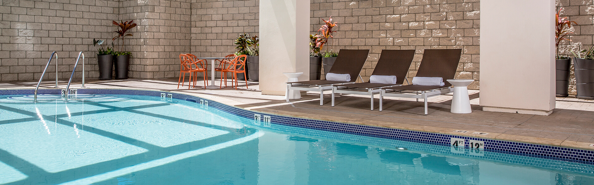 Pool and deck with loungers