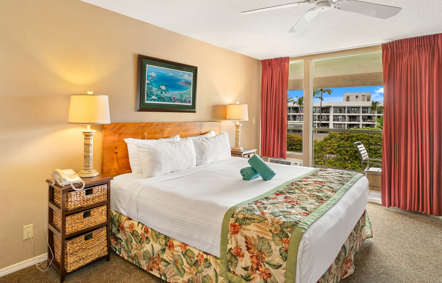 Room with bed, night stand, lamps, balcony.