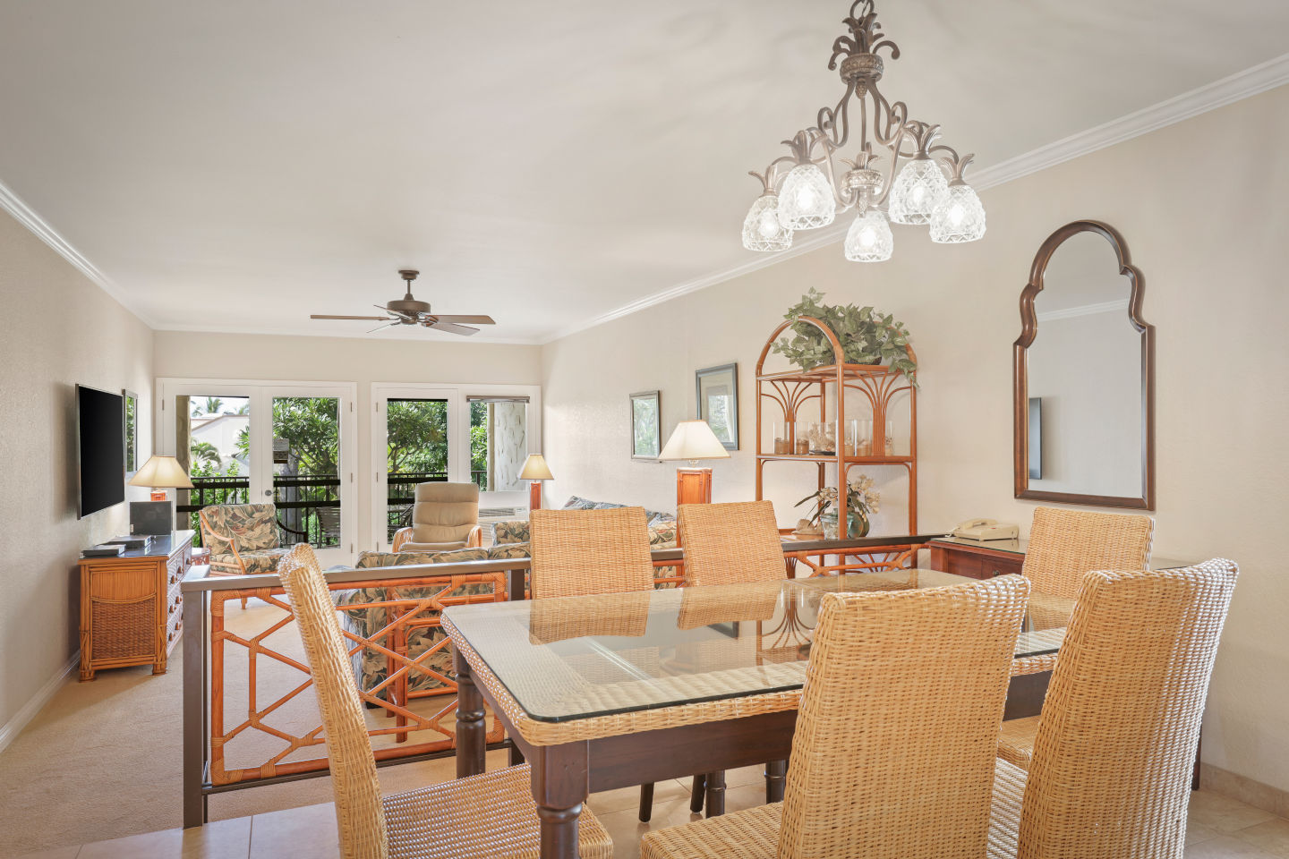 Separate dining table with seating and a light fixture 