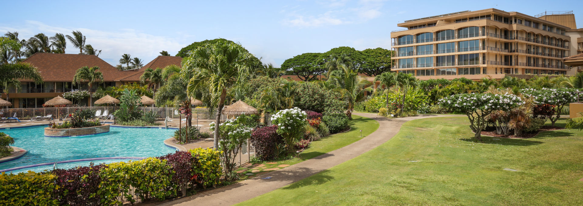 View of the lush landscape and pool area