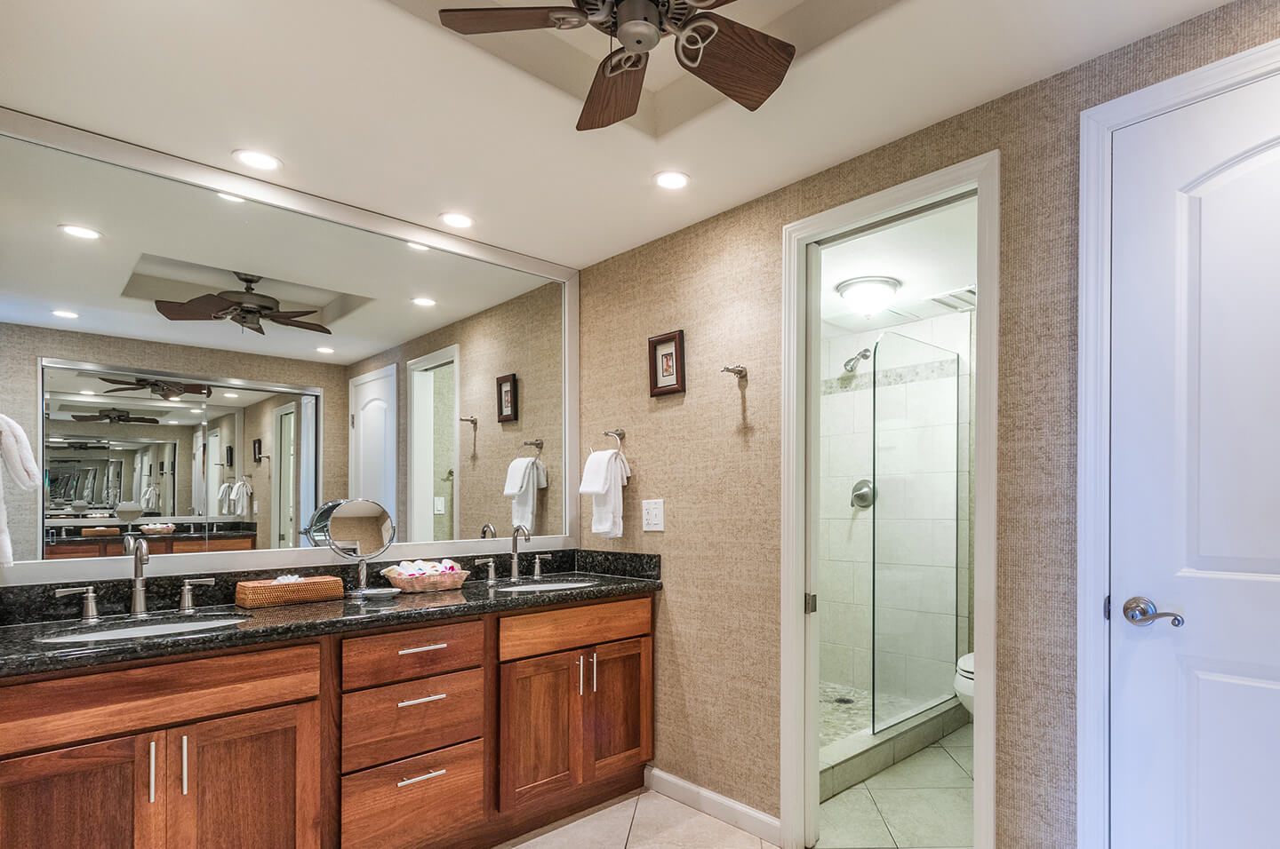 Bathroom with sink and separate shower.
