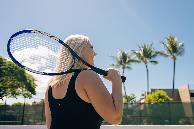 Woman holding tennis racket