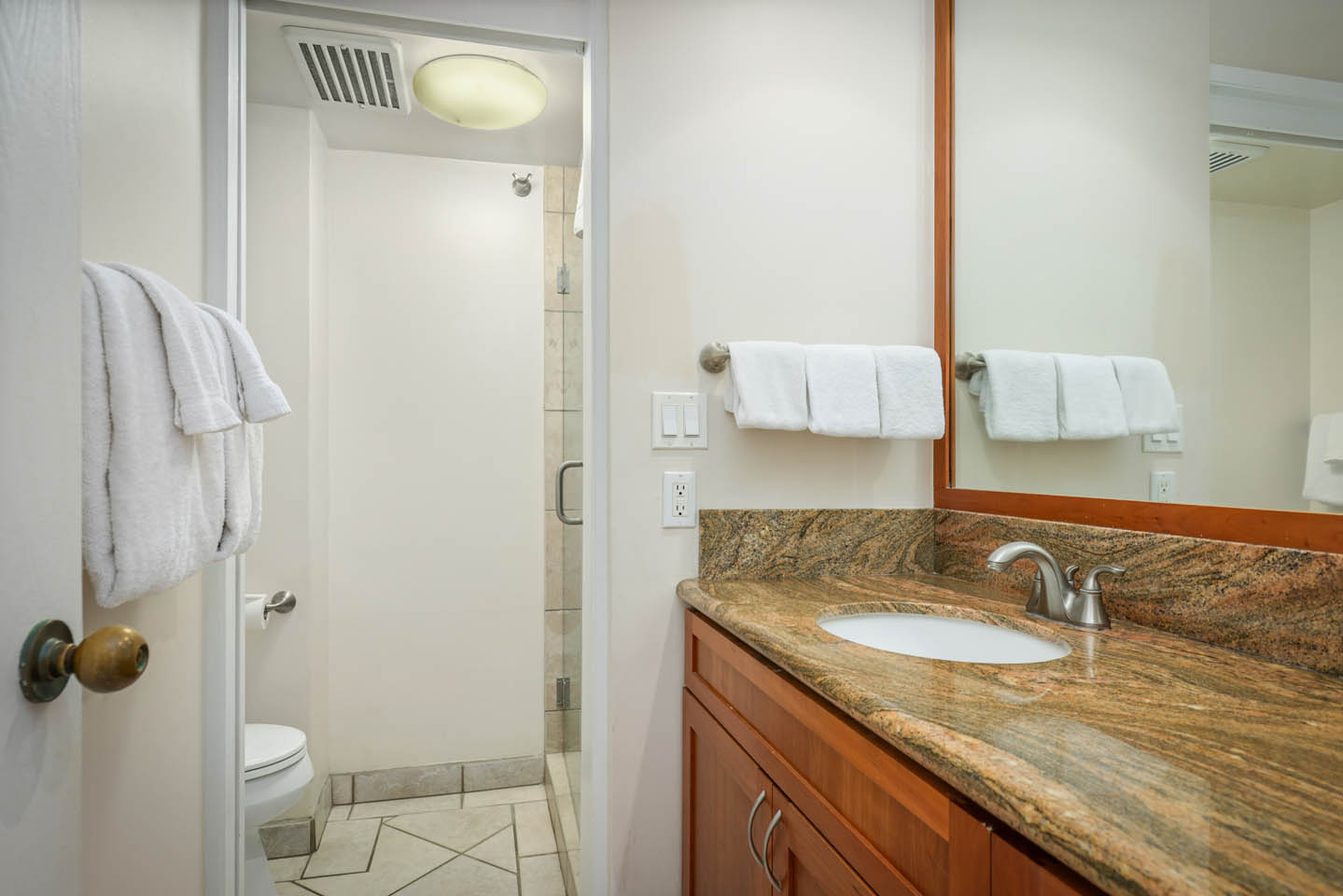 Bathroom sink and shower.
