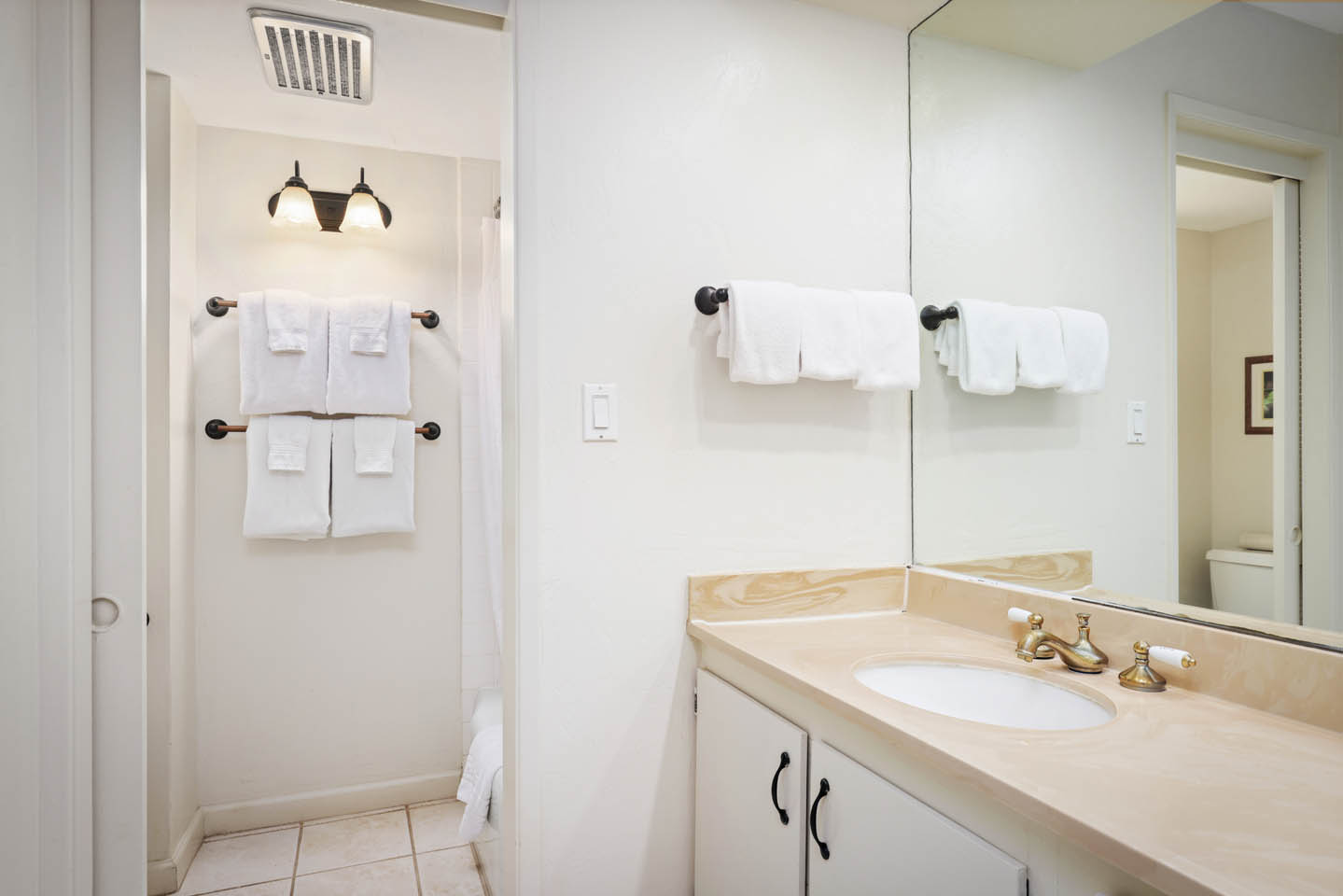 Bathroom sink and shower.