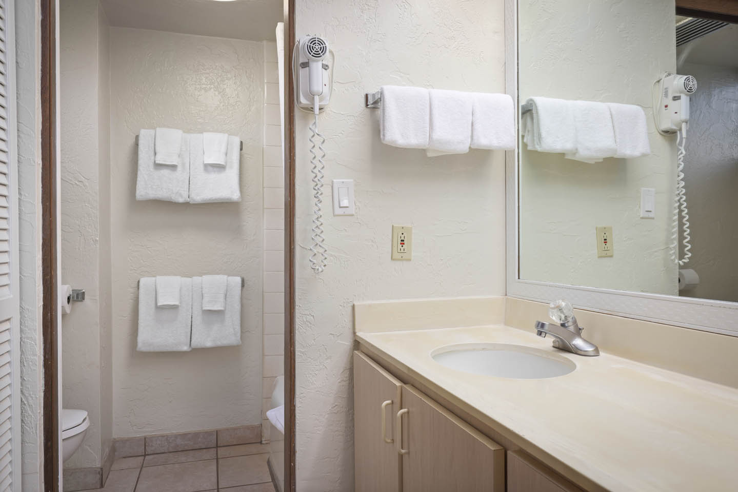 Bathroom sink and shower.