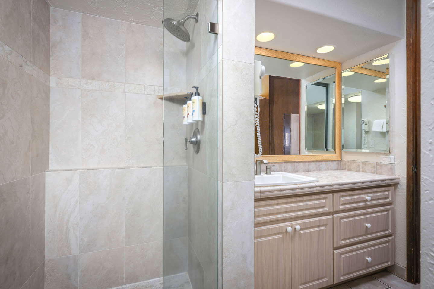 Bathroom sink and shower.