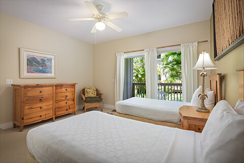 Room with 2 beds, dresser, night stands, lamps, patio