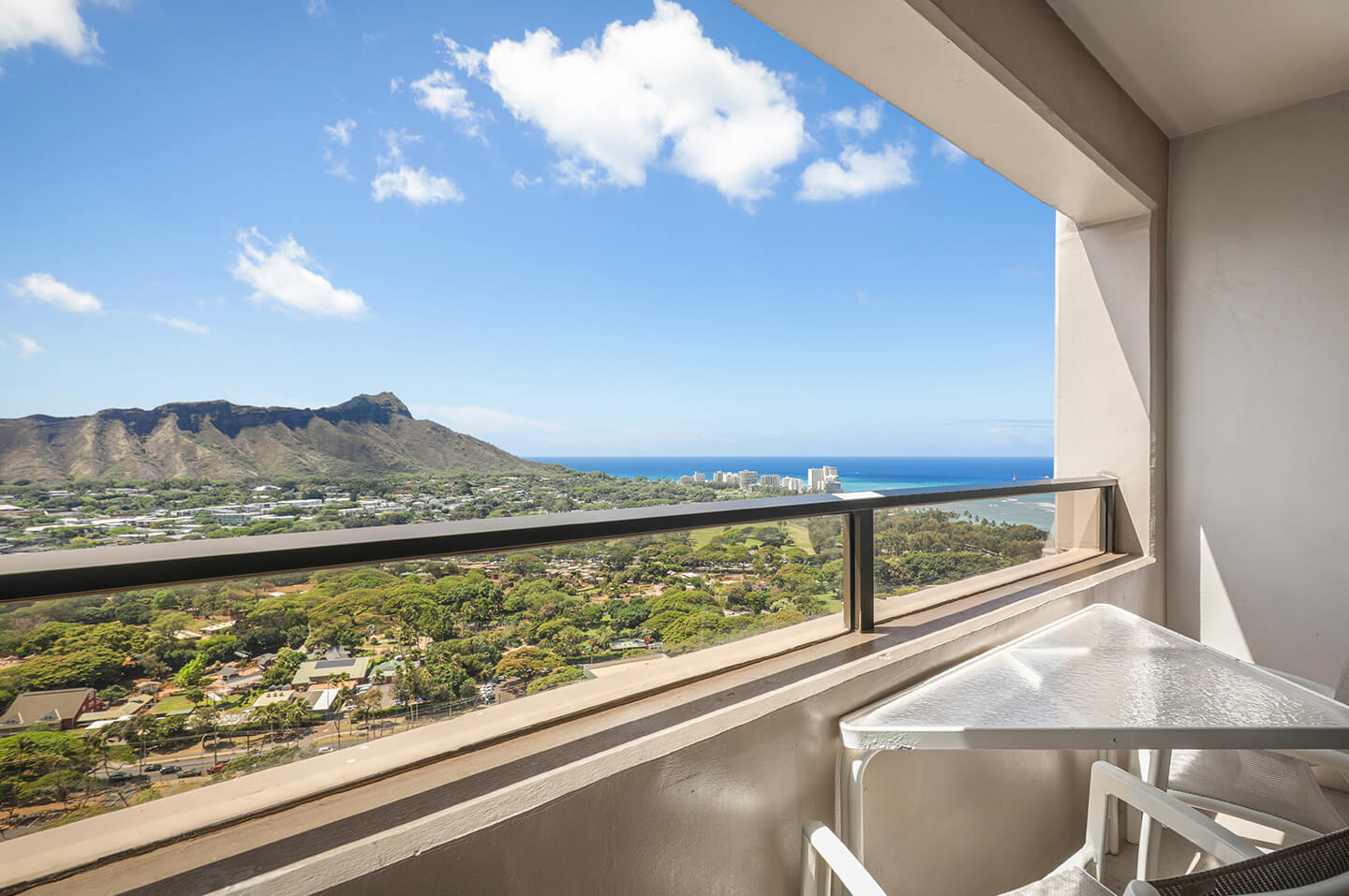 Two-Bedroom Partial Ocean View Balcony Overlooking Daimond Head and Waikiki.