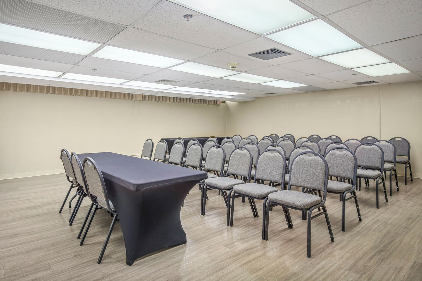 Meeting room with chairs and a table.