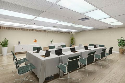 Conference room with tables and chairs.