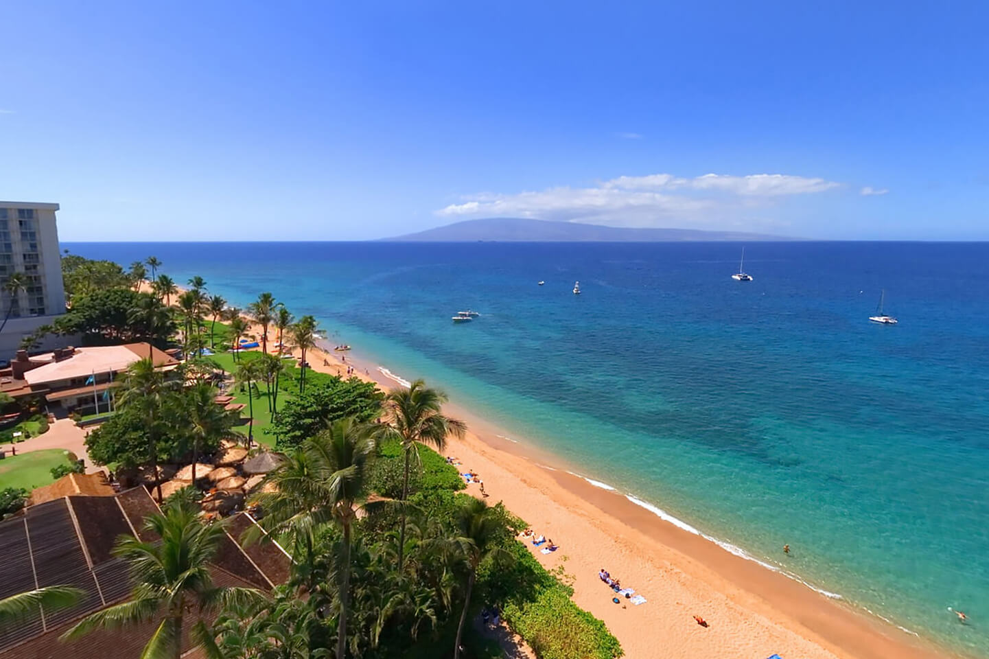 Balcony view of beachfront and neighbor island.