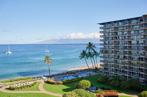 View of property and ocean