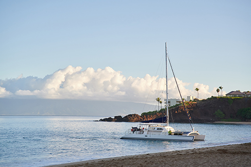 Beachfront with catamaran