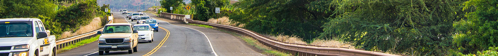 Cars driving on road