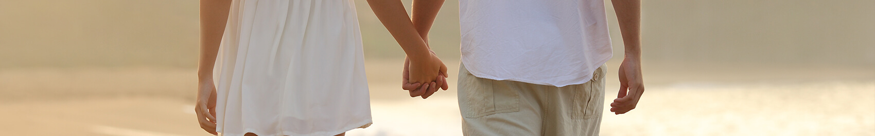 Close up shot of couple holding hamds